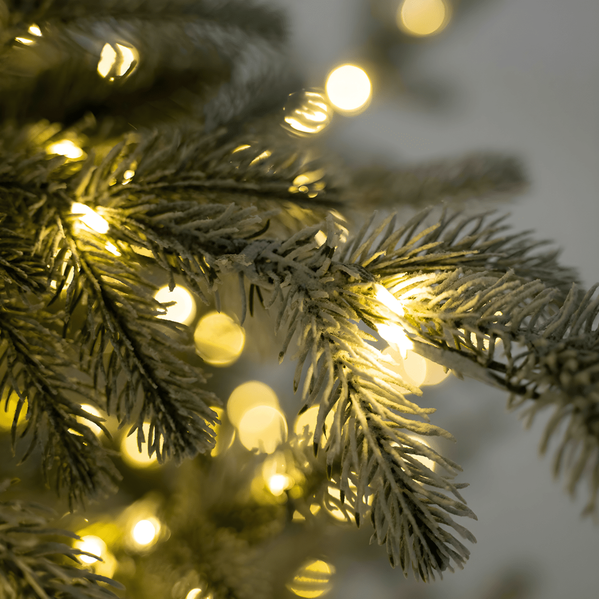 Albero di Natale innevato "Sistem flok" con micro led in PE effetto Real Touch + PVC + Flock - MondoViro