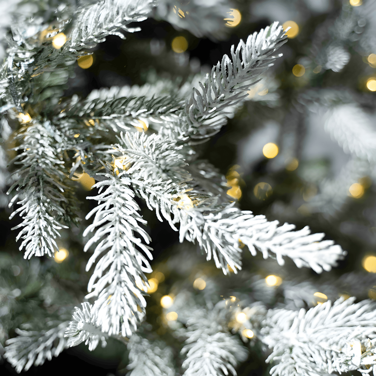 Albero di Natale innevato "Sistem flok" con micro led in PE effetto Real Touch + PVC + Flock - MondoViro