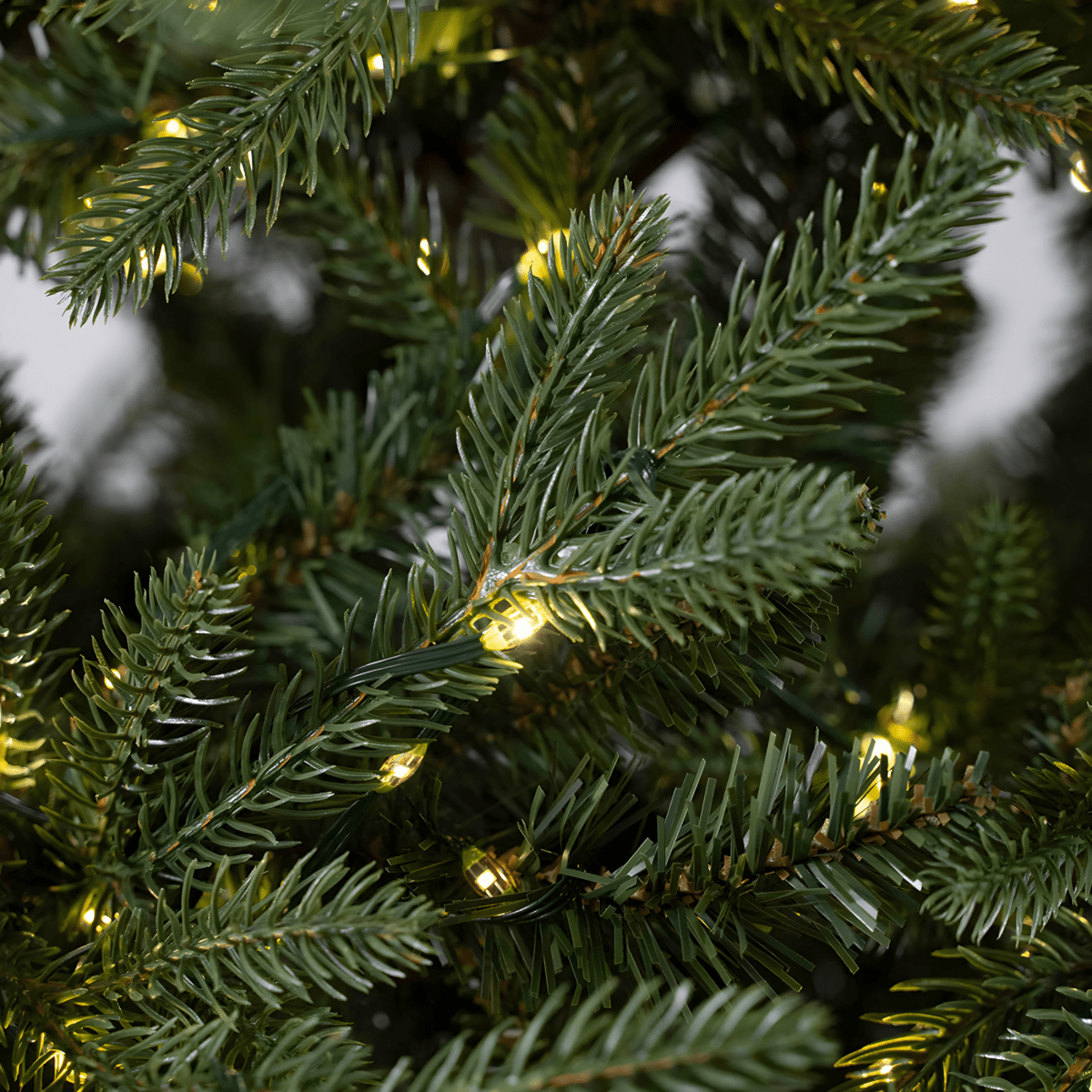 Albero di Natale "Rudolph" con Led e tronco marrone 80% PE effetto Real Touch - MondoViro